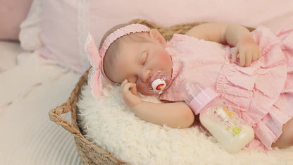19 Zoll lebensechte Reborn Puppe mit geschlossenen Augen August im rosa Kleid