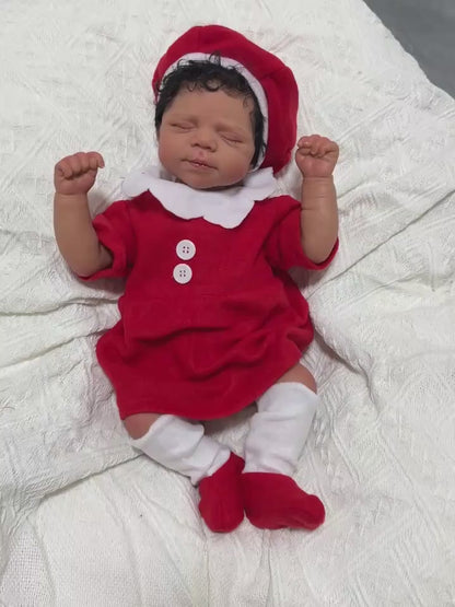 19 Zoll lebensechte Reborn-Puppe mit geschlossenen Augen und dunkler Haut in Weihnachtskleidung - Pascale