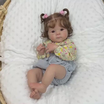 48 cm Reborn Puppe Bettie mit offenen Augen und weichem Körper in geblümter Kleidung