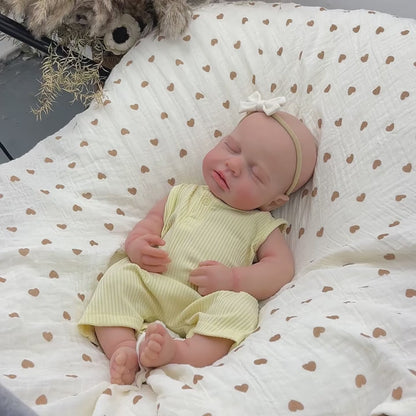 45 cm dehnbare Loulou Reborn Puppe aus Vollsilikon schlafend in gelben Outfits