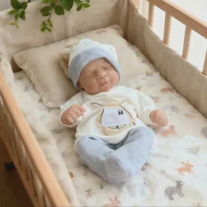 48 cm lebensechte handbemalte Reborn-Babypuppe Pascale mit geschlossenen Augen.