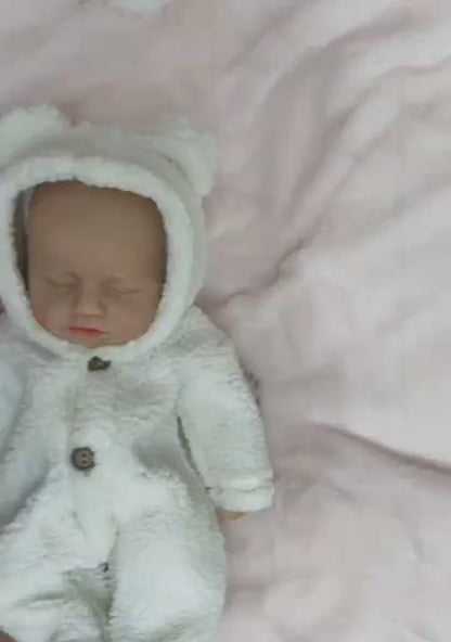 30 cm lebensechte Reborn-Puppe aus Vollsilikon mit geschlossenen Augen Mädchen in weißer Plüschkleidung